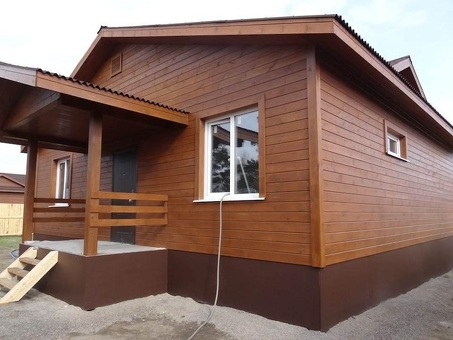 Стоимость облицовки имитацией древесины для внешней отделки дома