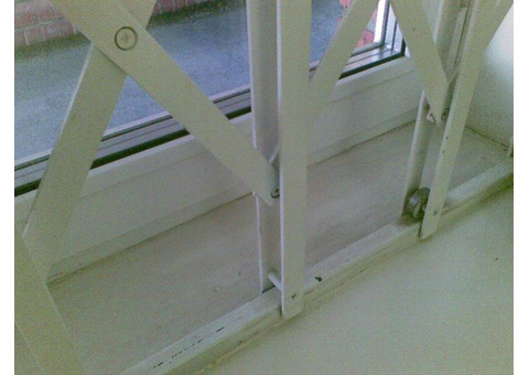 Решетки на окна раздвижные из спаренной стальной полосы